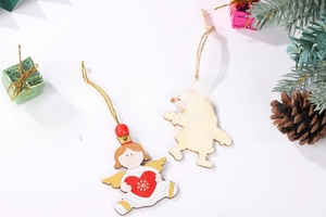 Detail of wooden Christmas angel and Santa pendants with hemp rope and festive beads