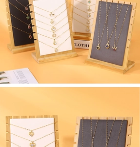 Bamboo necklace display stand featuring tiered slots and soft velvet lining textures