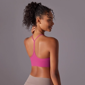 Detailed Y-back strap design on fuchsia double-brushed yoga sports bra for women