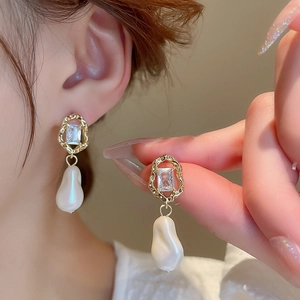 Vintage gold earrings with baroque pearl and cubic zirconia in a French style