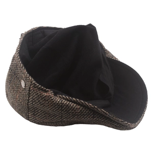 Classic tweed newsboy cap in brown and gray plaid pattern with a soft inner lining