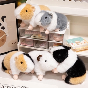 Realistic guinea pig plush toys in various colors displayed on a white shelf