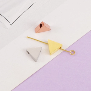 Mirror polished stainless steel triangle charms in gold, silver, and rose gold finishes