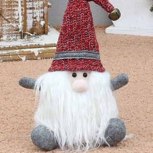 Christmas gnome doll gift bag with red knitted hat and white beard festive decoration