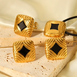 Vintage 18K gold plated stainless steel jewelry set with black enamel inlay