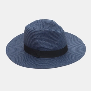 Detailed close-up of navy blue woven straw sun hat featuring a classic black ribbon band