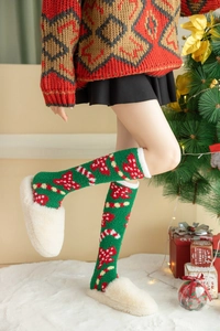 Details von Korallenfleece Weihnachtssocken mit Zuckerstangen- und Schleifenmuster