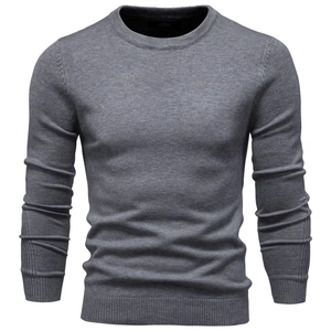 Detailed view of dark grey slim fit sweater with ribbed cuffs and round neck texture