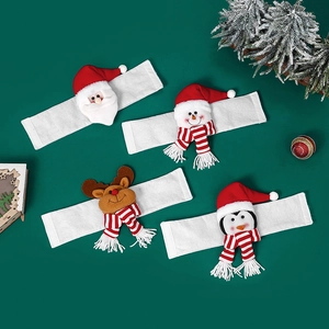 Set de 4 alzapaños navideños con figuras de Papá Noel, muñeco de nieve, reno y pingüino