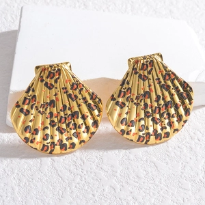 Fashionable shell earrings with leopard print and gold finish in a minimalist style