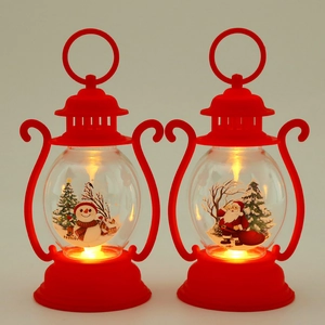 Detail of red Christmas lantern set with Santa Claus and Snowman LED candle scenes