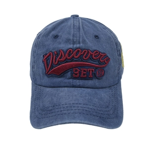 Washed blue cotton baseball cap with red Discovery embroidery in a vintage style