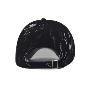Detailed back view of a black tie-dye baseball cap with silver flame print and metal buckle