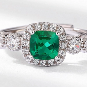 Classic S925 silver halo ring with cushion-cut emerald and sparkling accent diamonds