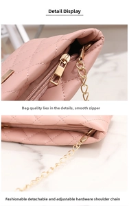 Detail of pink quilted PU leather bag with gold-tone zipper and adjustable chain strap