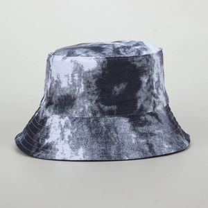 Fashionable black and white tie-dye bucket hat in canvas for sun protection and travel