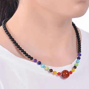 6mm natural pink quartz and tiger eye beaded chakra necklace on female model neck