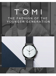 Close-up of minimalist TOMI watch featuring a white dial, date window, and black leather strap