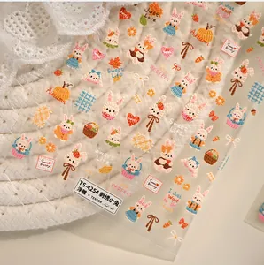 Detail of 5D embossed nail stickers featuring cute rabbit and pumpkin embroidery patterns