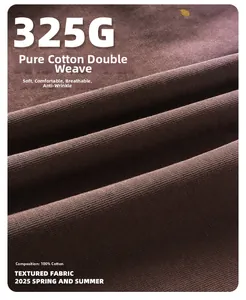 Primer plano macro de tela 100% algodón de 325G en marrón oscuro con doble hilado