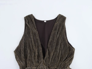 Detail of deep V-neck sleeveless dress with vertical gold stripes and size S label