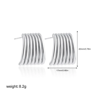 Detailed view of silver striped stud earrings with size and weight measurement indicators