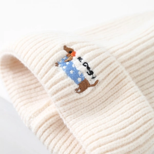 Winter knit hat for kids with cute dachshund embroidery in off-white ribbed style