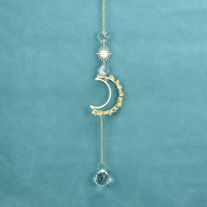 Detailed sun and moon crystal suncatcher with faceted glass beads and gold finish
