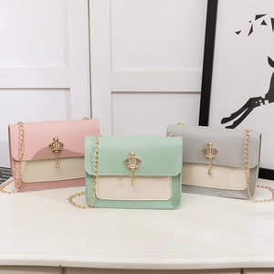 Women's mini crossbody bags in pink, green, and gray with golden crown tassels