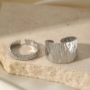 2-piece set of silver stainless steel rings with irregular bark and woven textures