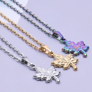 Stainless steel maple leaf pendant necklaces in gold, silver and rainbow finishes