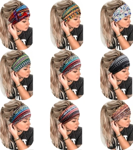 Detailed close-up showing various African print patterns on wide elastic yoga headbands