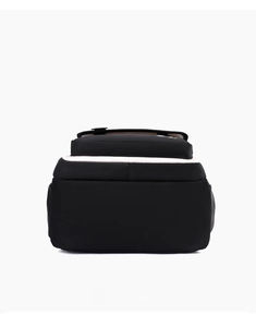 Detailed bottom view of the black waterproof school backpack with wide base and white piping