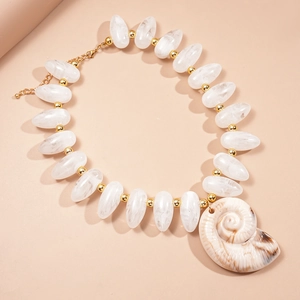 Resin beaded necklace featuring a large shell pendant and elegant gold spacer beads