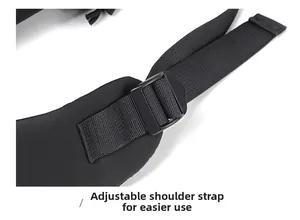Detail of adjustable padded shoulder strap on a black nylon backpack for maximum comfort