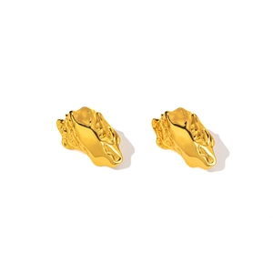 Pair of gold vintage stud earrings with irregular lava texture in polished titanium steel