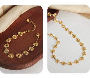 Detailed view of golden spiral geometric necklace and bracelet set on professional display