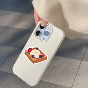 Close-up of matte cream phone case featuring a cute cat sleeping on strawberry toast