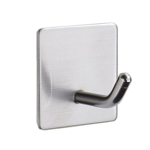 Detailed macro view of silver brushed stainless steel adhesive hook with L-shape design
