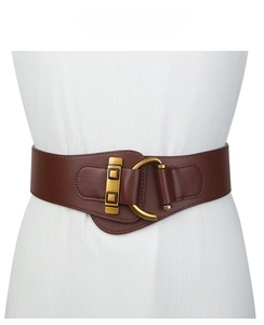 Detail of wide brown leather corset belt featuring vintage gold D-ring buckle on white knit