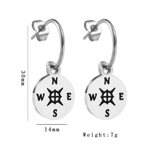 Detailed view of silver compass earrings showing dimensions 30mm by 14mm and 7g weight