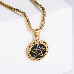 Vintage gold Nordic Viking necklace with a pentagram and runic circle on white background