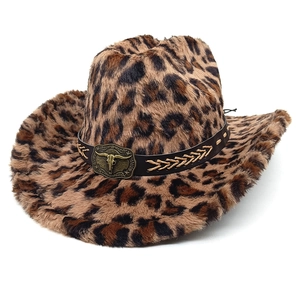 Detailed view of leopard print cowboy hat featuring a vintage bull skull emblem and rope band