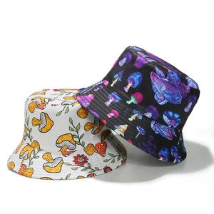 Reversible cotton bucket hat with colorful mushroom print in black and white styles