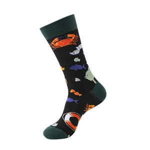 Detail of crew sock featuring knitted sea life patterns with orange crabs and fish