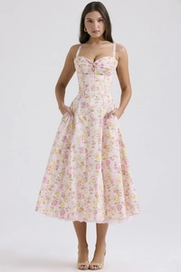 Detail of floral spaghetti strap maxi dress with bustier design and slim waist fit