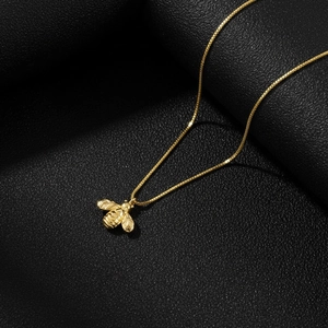 Minimalist 18K gold plated bee pendant necklace with detailed insect wings on box chain
