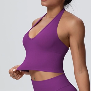 Detail showing the high elasticity and ribbed texture of this purple seamless yoga bra