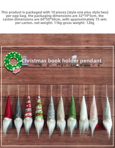 Flat lay of ten handmade Christmas gnomes with knit hats on a rustic wood background