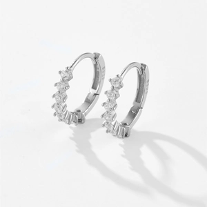 Detailed view of S925 sterling silver hoop earrings with sparkling zircon stones
